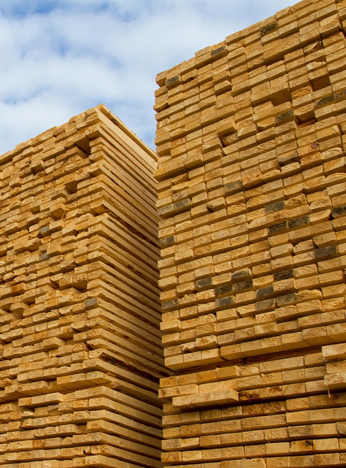 Stacks of lumber at lumber yard. 