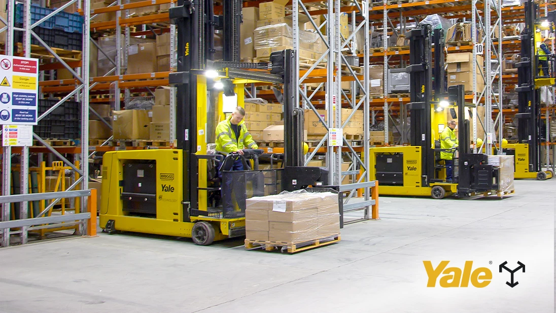 Series of Yale very narrow aisle (VNA) trucks in a warehouse. 